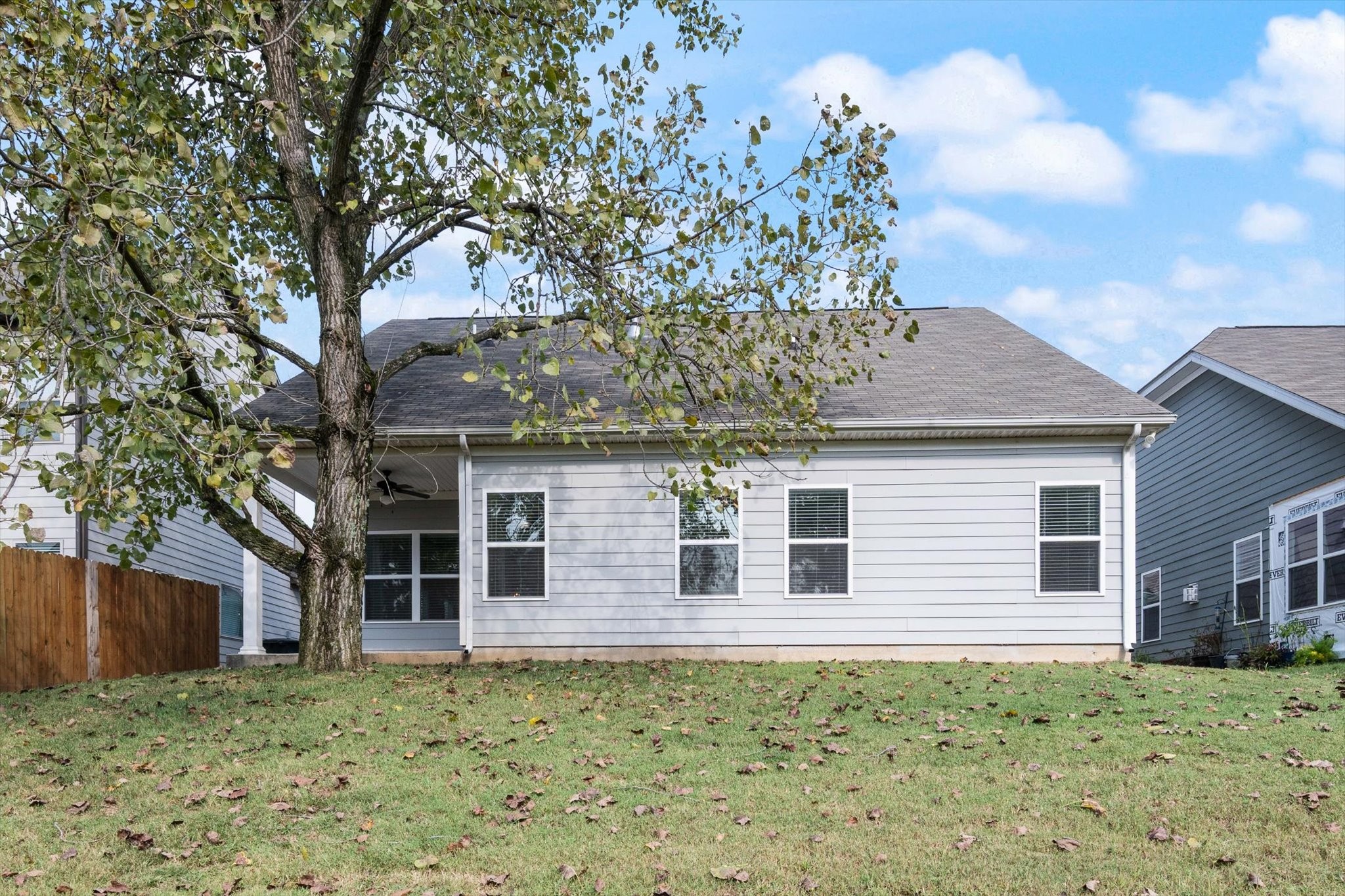 920 Carnation Drive Spring Hill, TN 37174 - Photo 24 of 27 a house that has a tree in front of the house