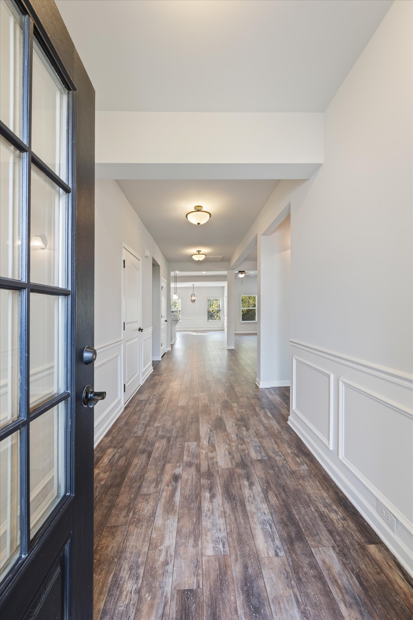 920 Carnation Drive Spring Hill, TN 37174 - Photo 3 of 27 a view of empty room with wooden floor and fan