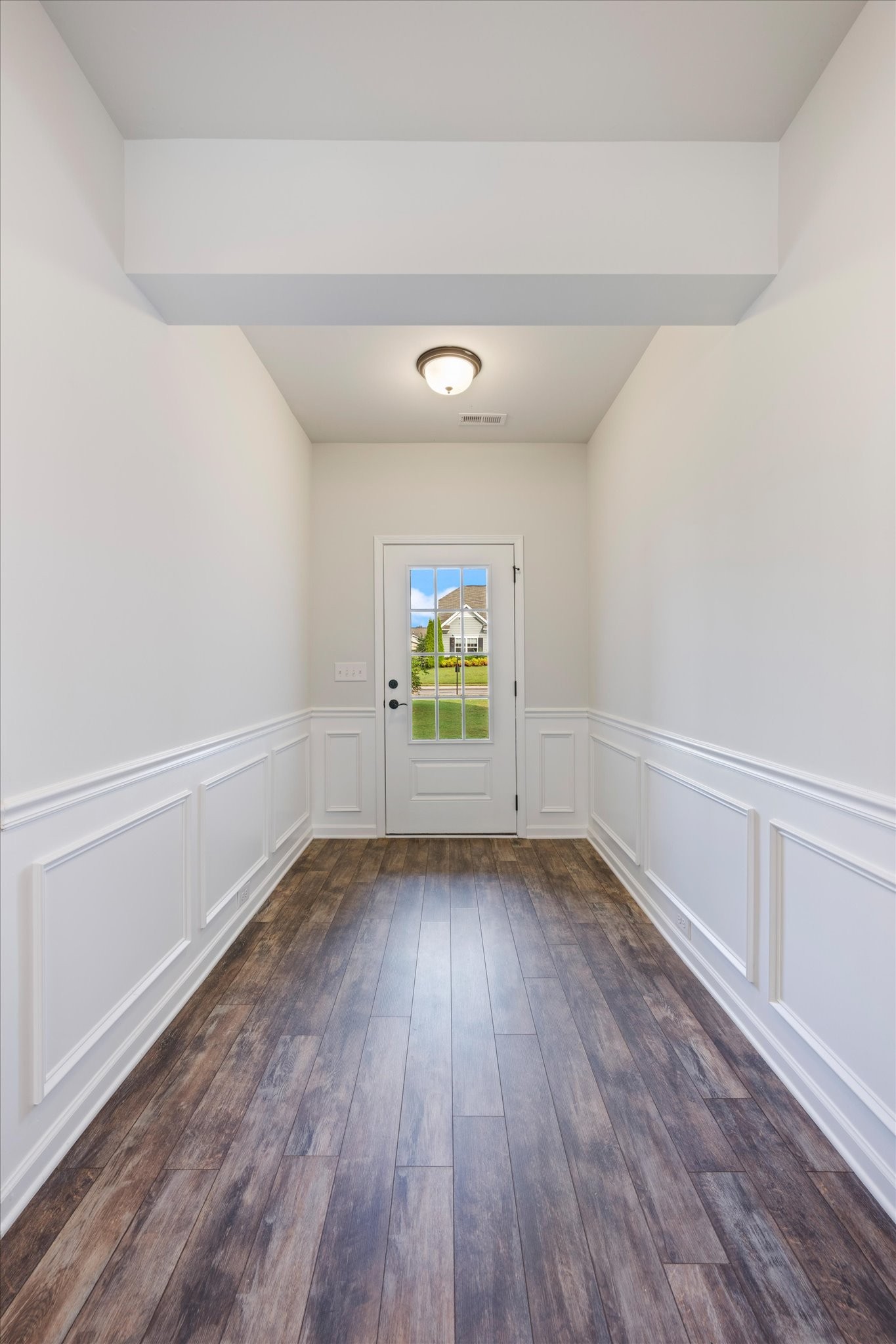 920 Carnation Drive Spring Hill, TN 37174 - Photo 4 of 27 a view of hallway with wooden floor
