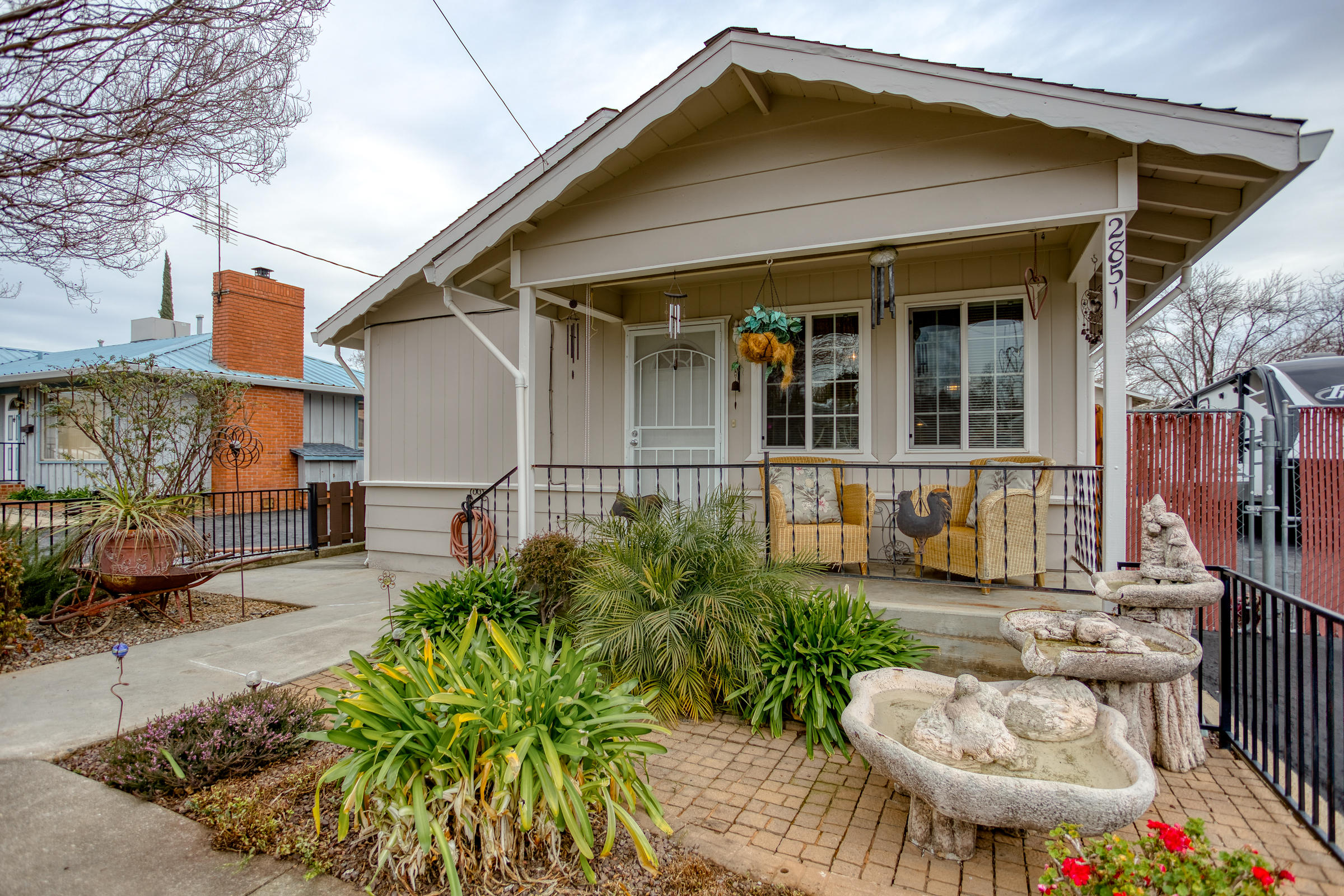 2851 Irwin Road Redding, CA 96002 - Photo 1 of 28 front view of a house with a chairs