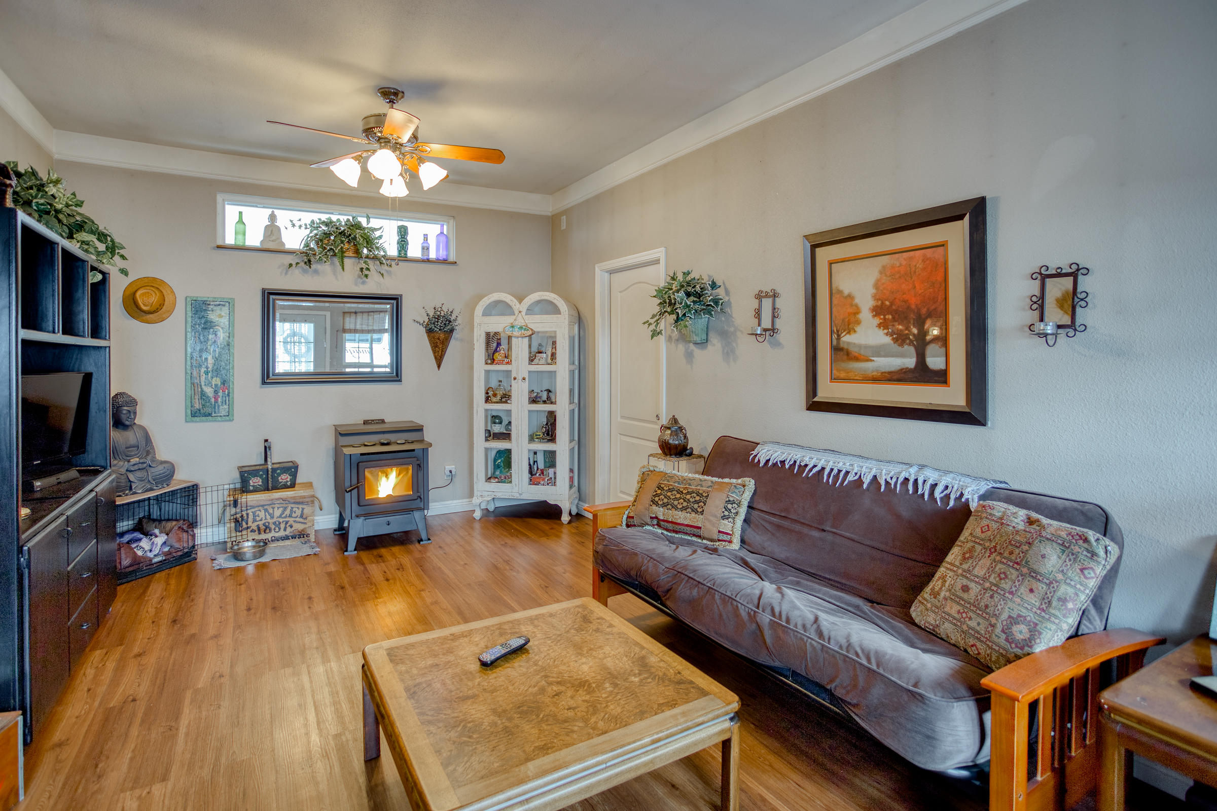 2851 Irwin Road Redding, CA 96002 - Photo 15 of 28 a living room with fireplace furniture and a flat screen tv