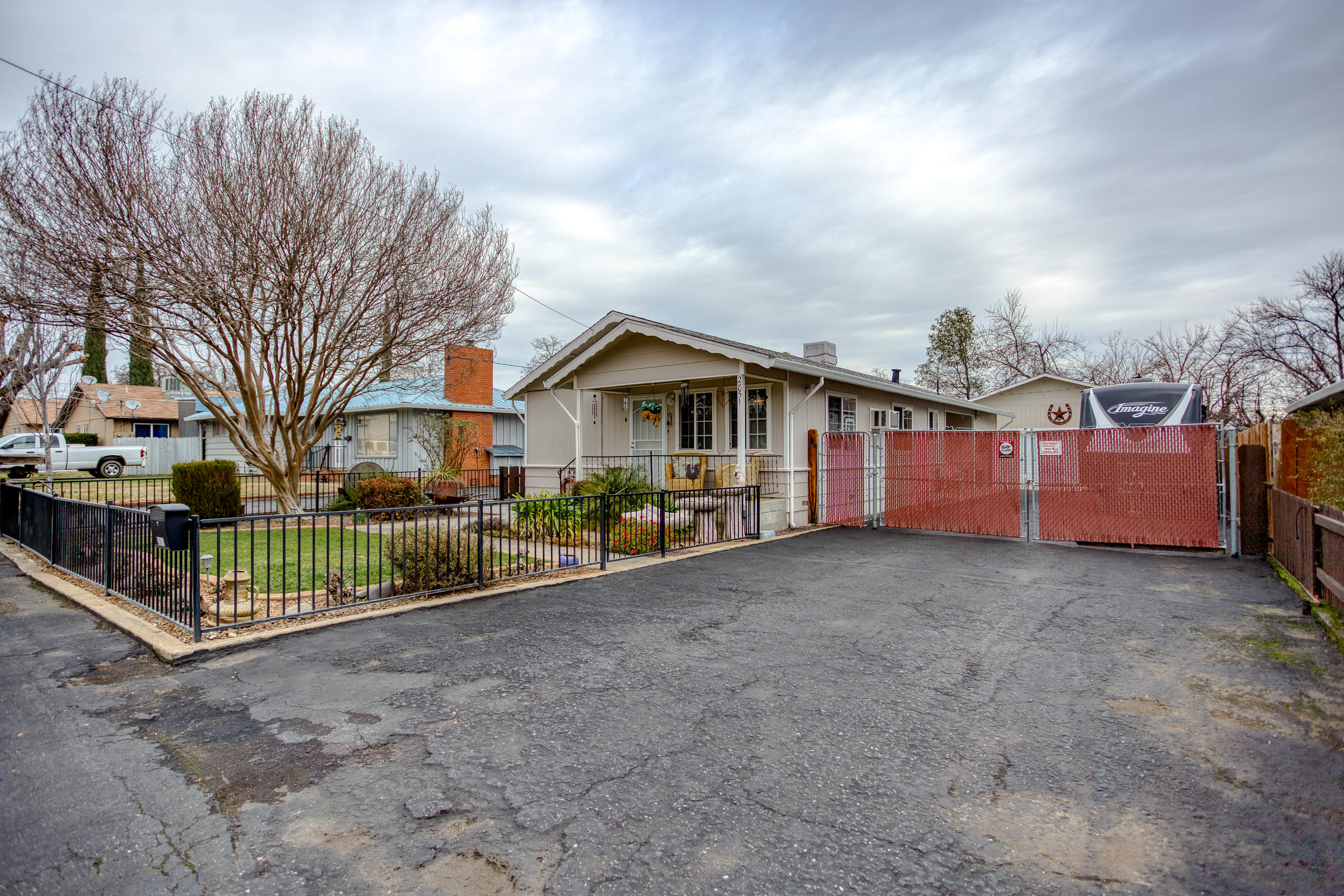 2851 Irwin Road Redding, CA 96002 - Photo 28 of 28 a view of a house with wooden fence