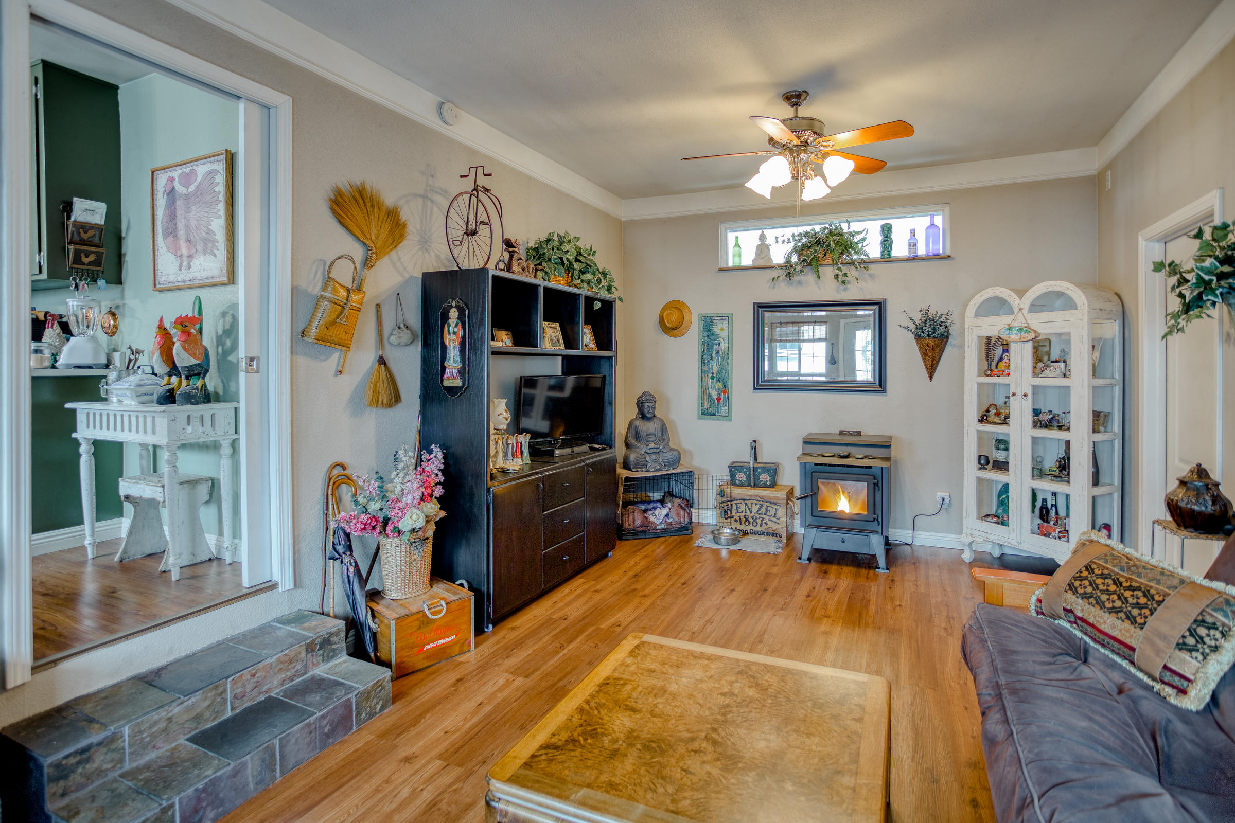 2851 Irwin Road Redding, CA 96002 - Photo 3 of 28 a living room with fireplace furniture and a flat screen tv