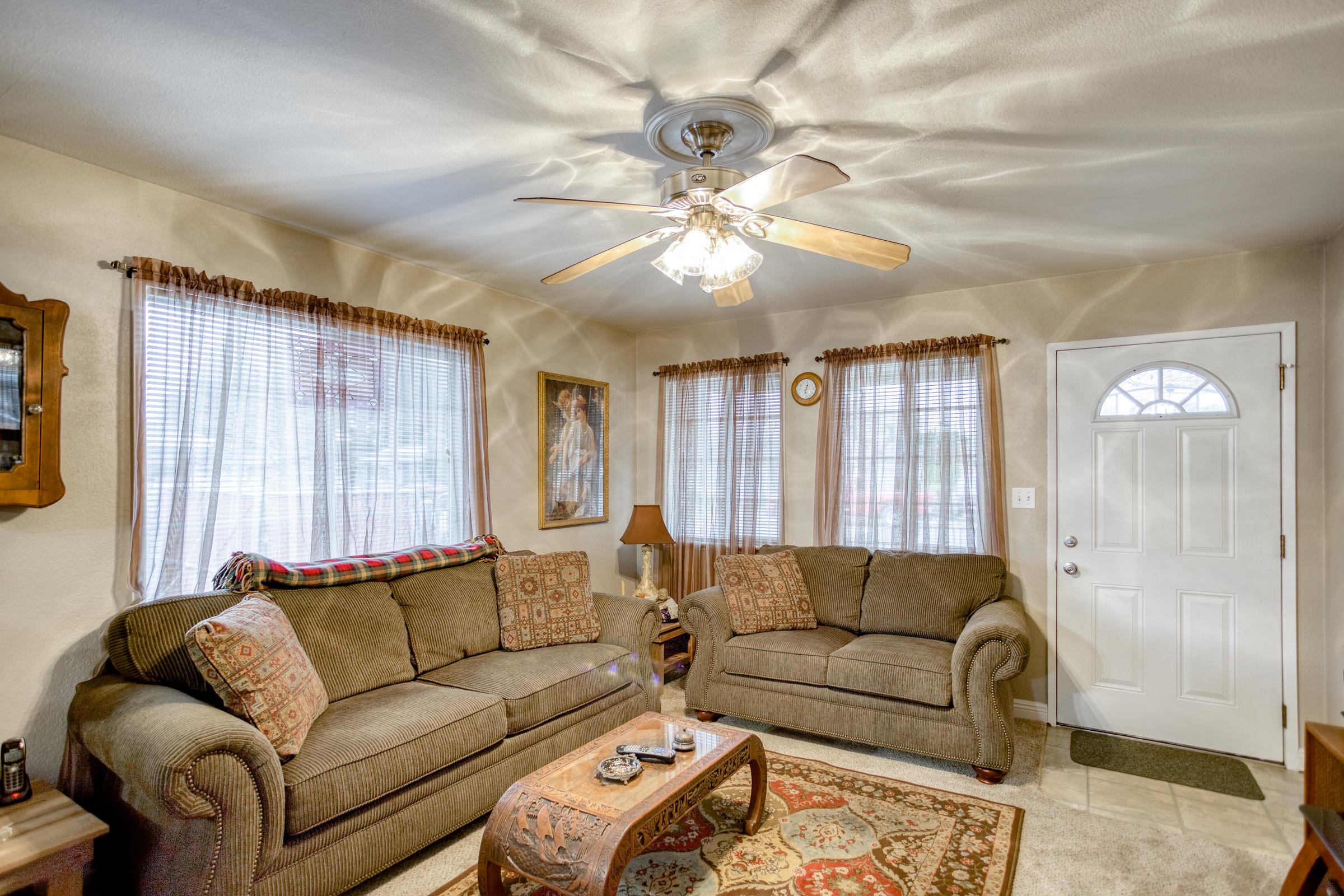 2851 Irwin Road Redding, CA 96002 - Photo 4 of 28 a living room with furniture and a large window