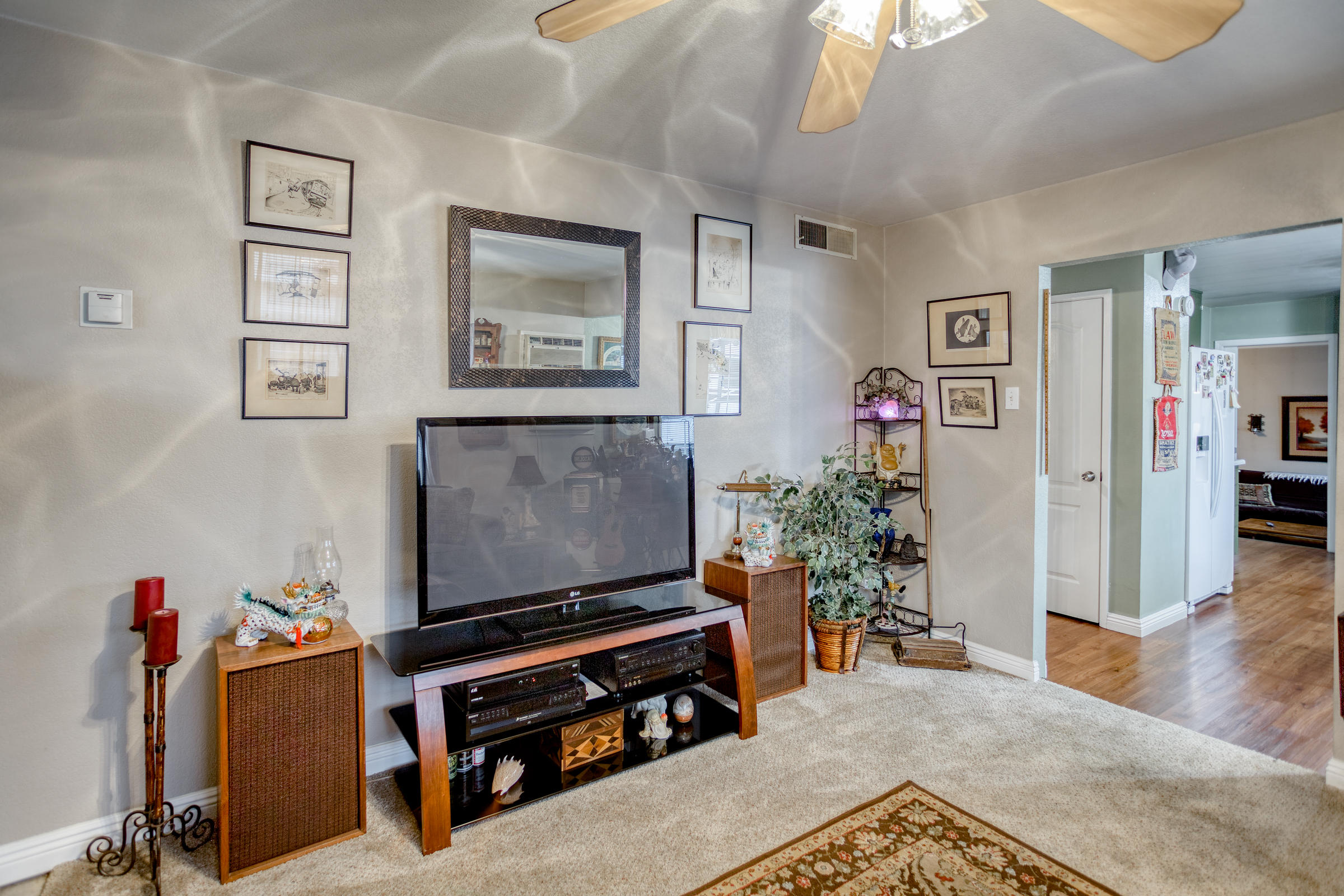 2851 Irwin Road Redding, CA 96002 - Photo 6 of 28 a living room with furniture and a flat screen tv