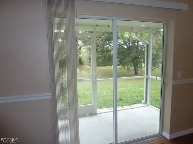 a view of a room that has a large window