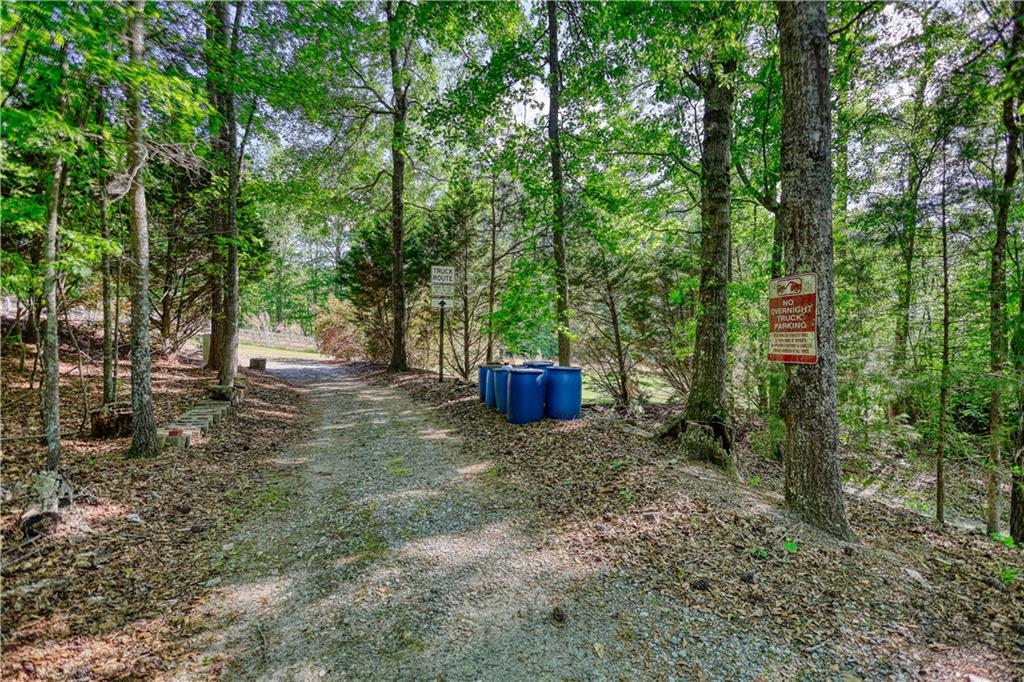 393 Edwards Road Oxford, GA 30054 - Photo 65 of 82 a view of a tree with a yard