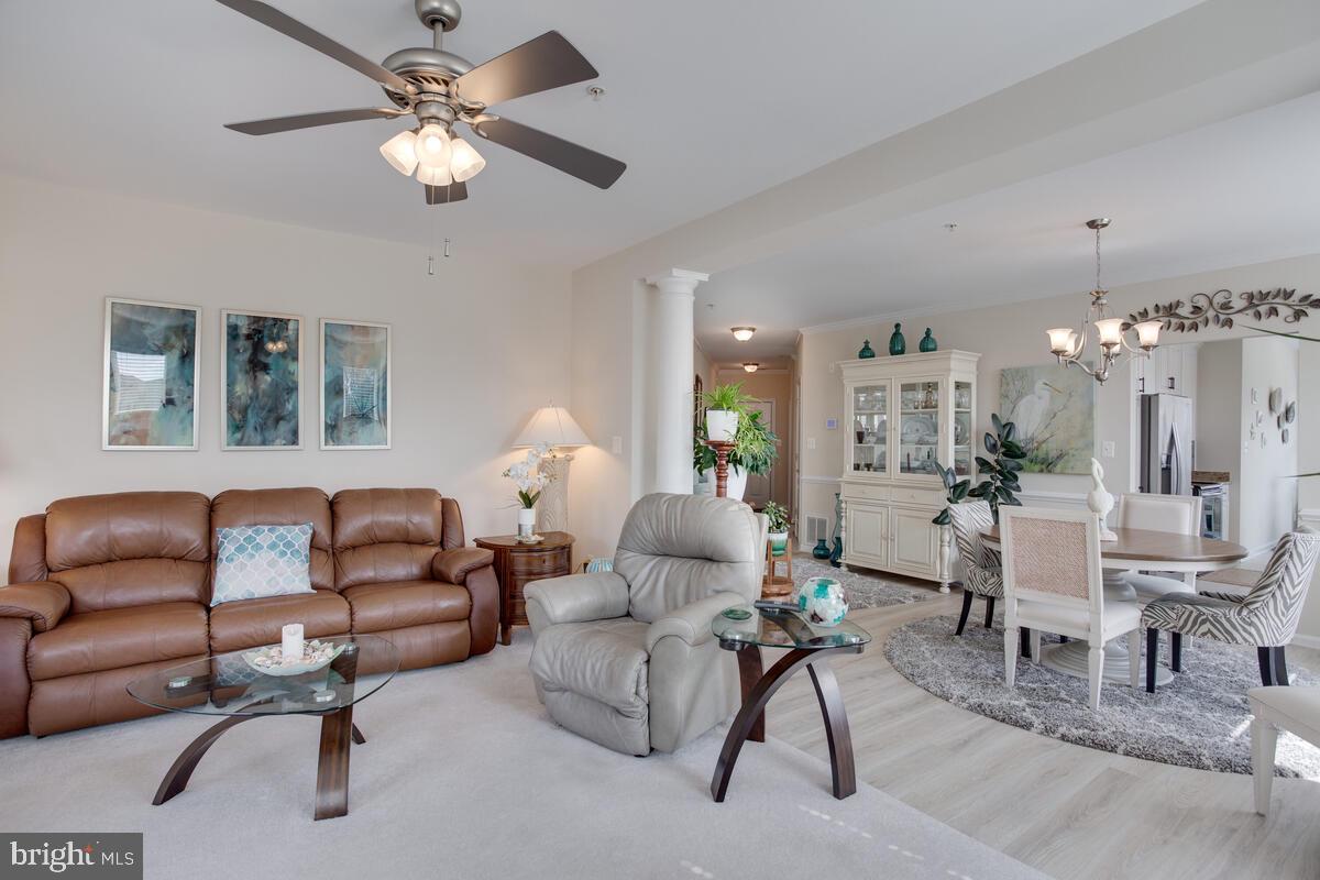 13824 Reef Way, Unit 301 Solomons, MD 20688 - Photo 10 of 64 Upgraded flooring and ceiling fans throughout
