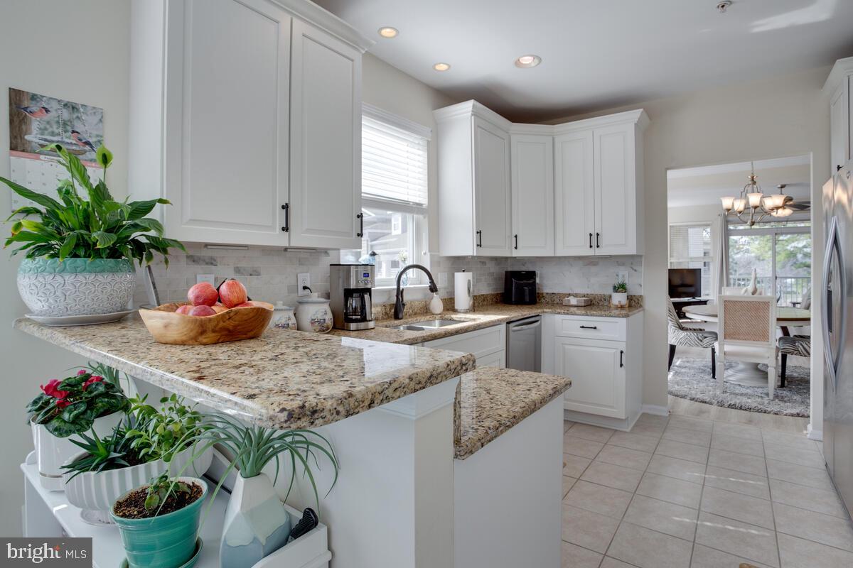 13824 Reef Way, Unit 301 Solomons, MD 20688 - Photo 12 of 64 Standout kitchen with upgraded cabinets