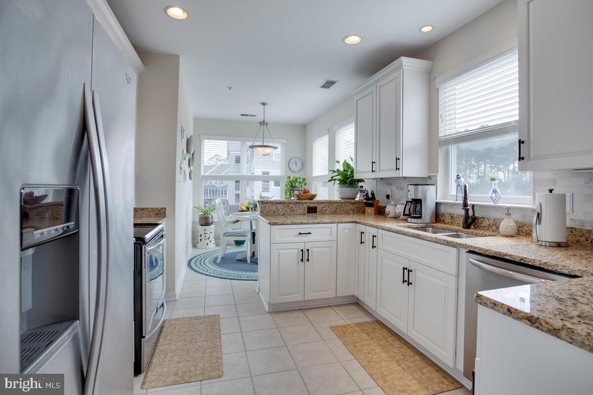 13824 Reef Way, Unit 301 Solomons, MD 20688 - Photo 13 of 64 Stainless steel appliances