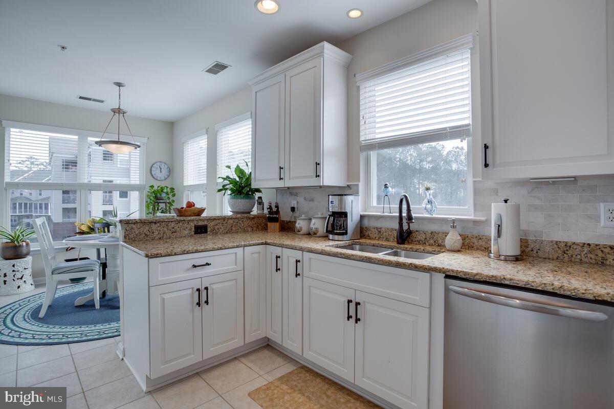 13824 Reef Way, Unit 301 Solomons, MD 20688 - Photo 17 of 64 Love this kitchen area
