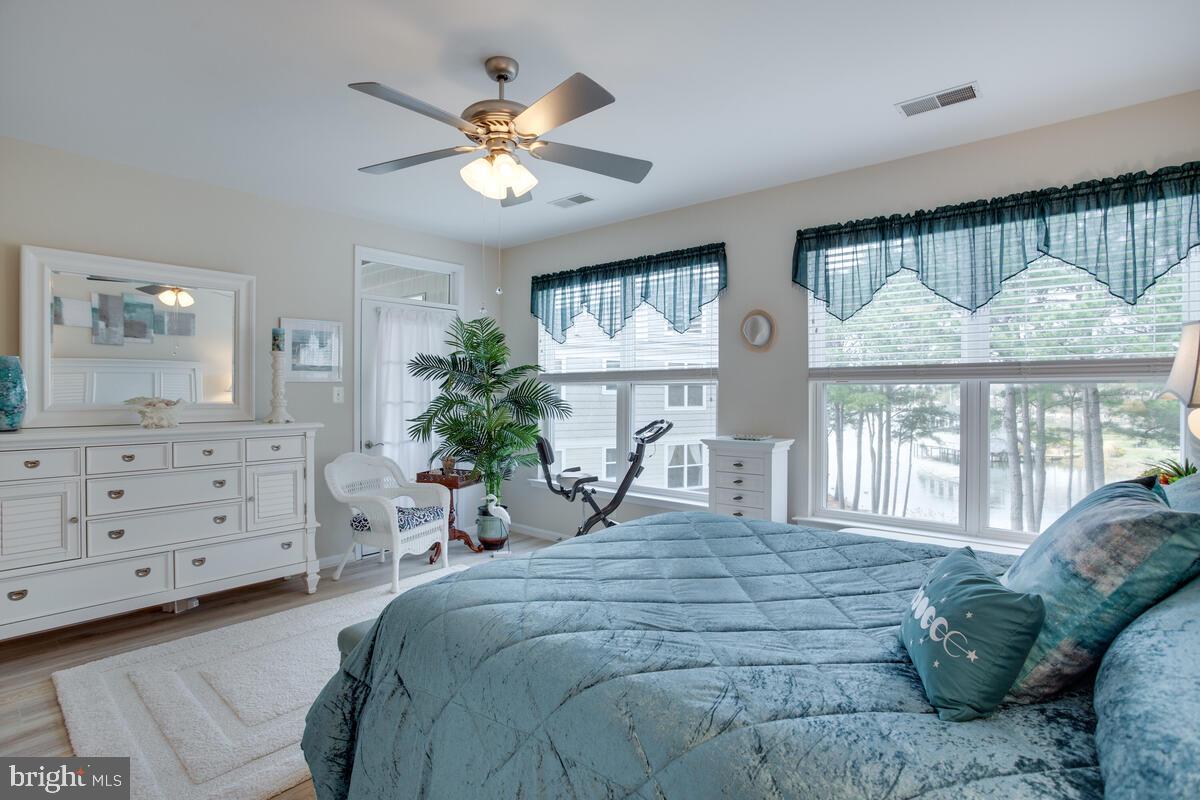 13824 Reef Way, Unit 301 Solomons, MD 20688 - Photo 20 of 64 Owners suite with balcony access - love it!