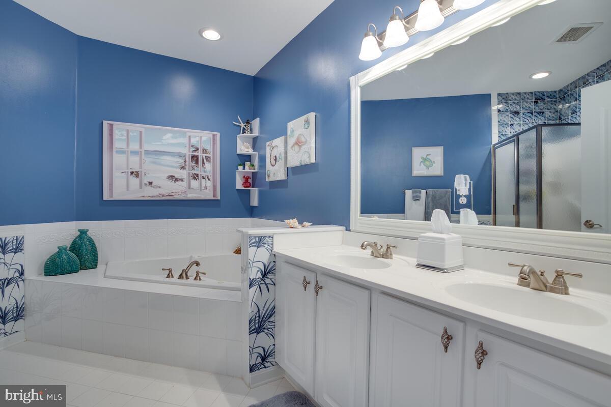 13824 Reef Way, Unit 301 Solomons, MD 20688 - Photo 21 of 64 Luxury bath - relax now.