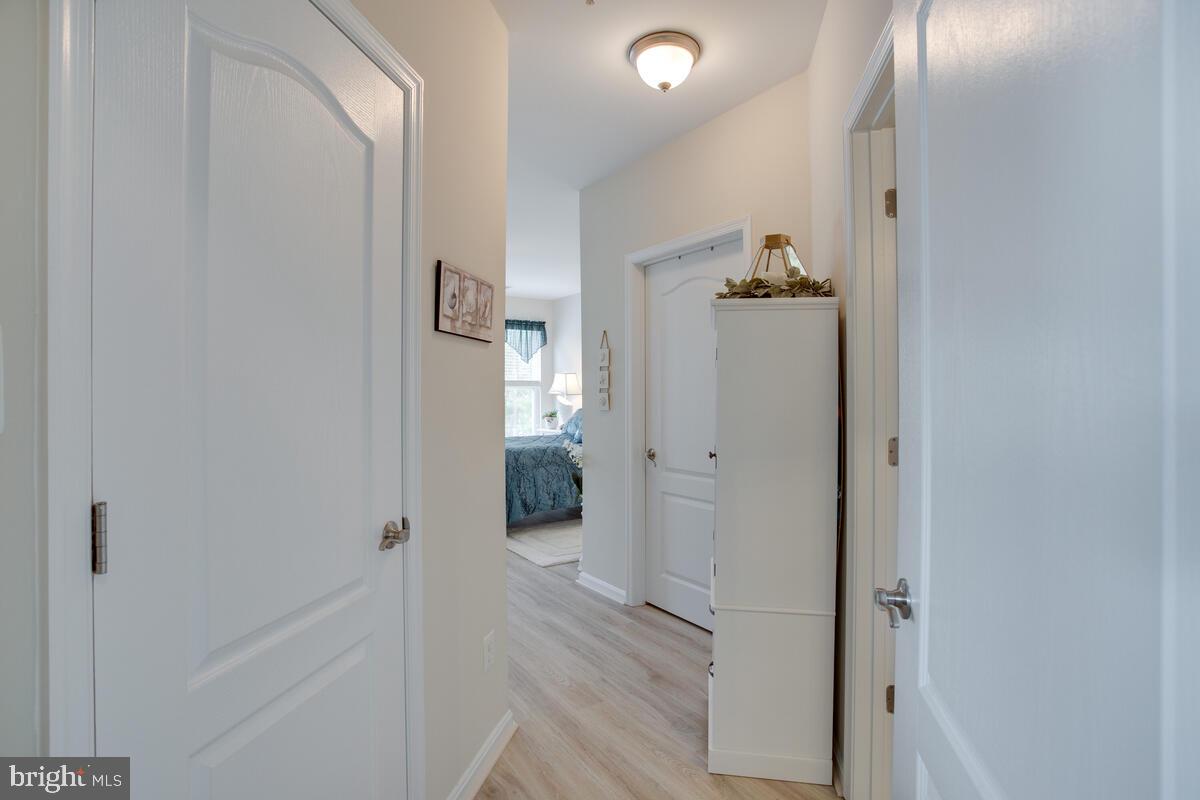 13824 Reef Way, Unit 301 Solomons, MD 20688 - Photo 24 of 64 Two walk-in closets in owners suite