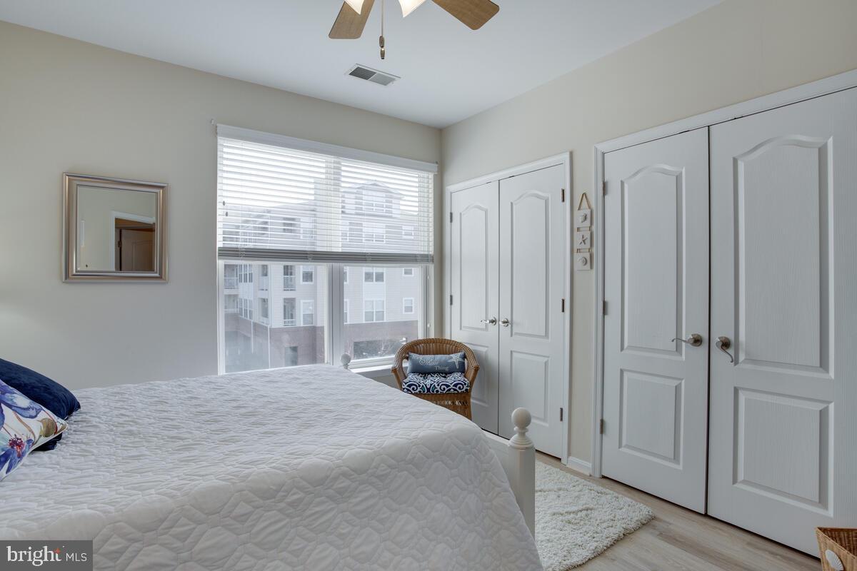 13824 Reef Way, Unit 301 Solomons, MD 20688 - Photo 27 of 64 2nd bedroom. Check out the closet space
