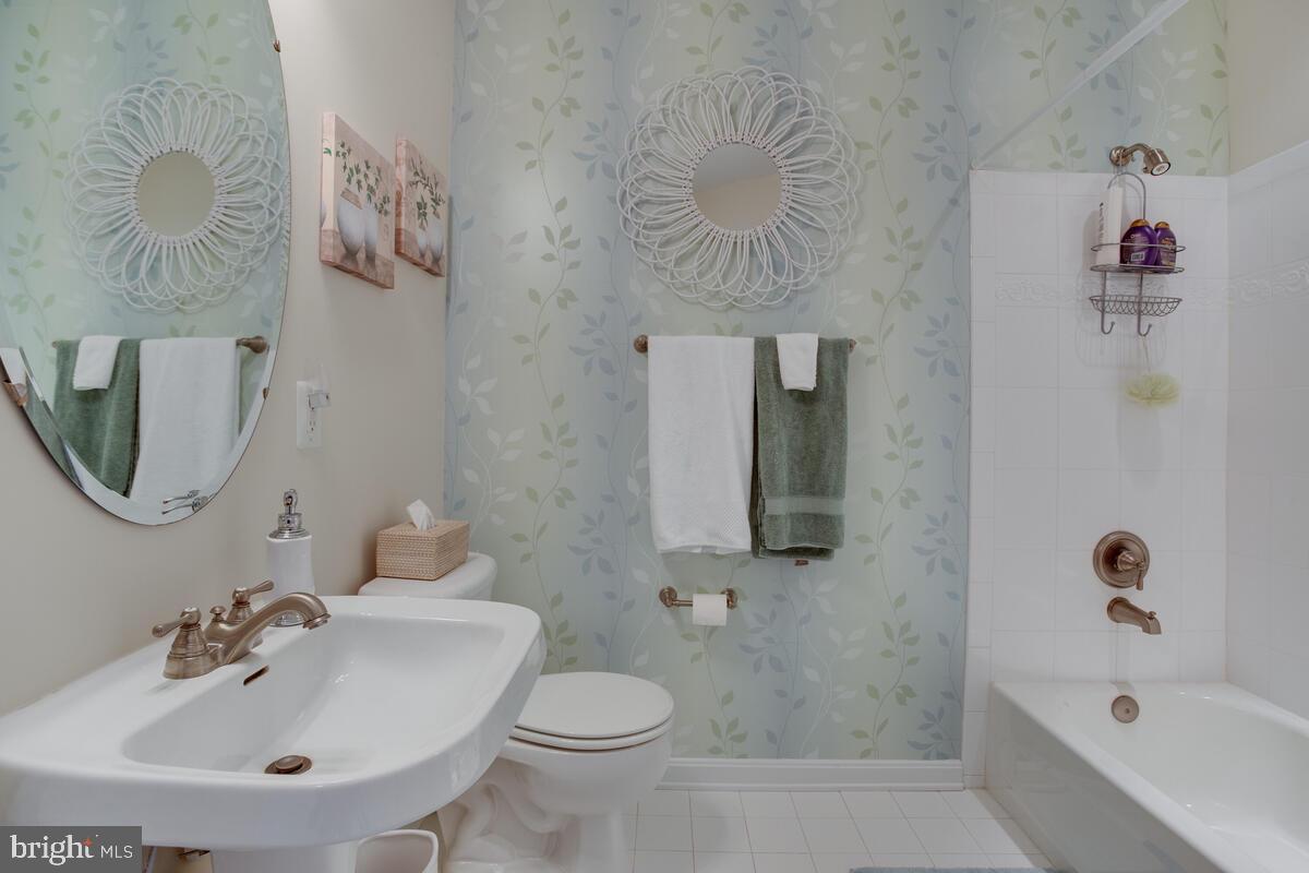 13824 Reef Way, Unit 301 Solomons, MD 20688 - Photo 29 of 64 Tub and shower glisten