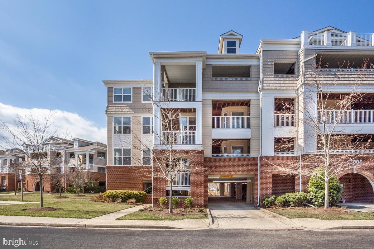 13824 Reef Way, Unit 301 Solomons, MD 20688 - Photo 3 of 64 End Unit. Lot of light!