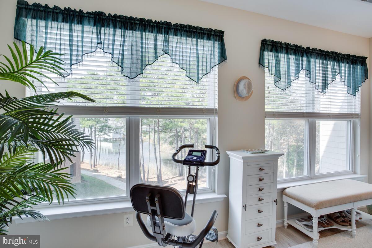 13824 Reef Way, Unit 301 Solomons, MD 20688 - Photo 37 of 64 Custom blinds throughout