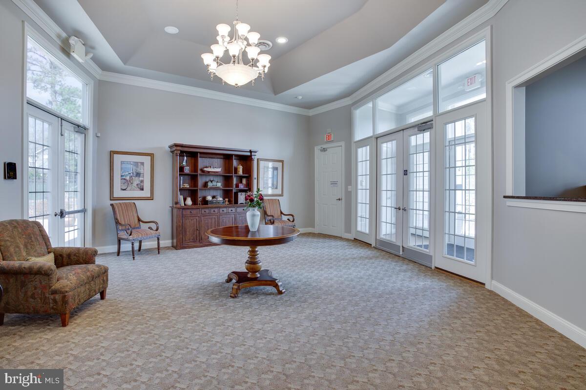13824 Reef Way, Unit 301 Solomons, MD 20688 - Photo 42 of 64 Welcome your guests to Oyster Bay clubhouse
