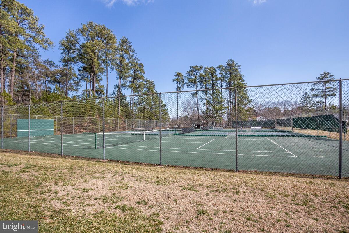 13824 Reef Way, Unit 301 Solomons, MD 20688 - Photo 46 of 64 Pickleball anyone? The residents get into it!