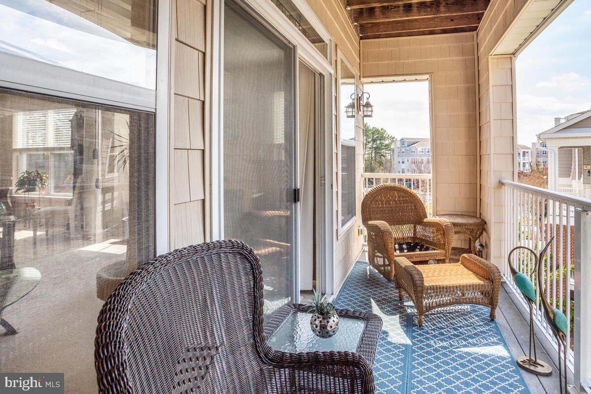13824 Reef Way, Unit 301 Solomons, MD 20688 - Photo 5 of 64 Front deck offers more outdoor space