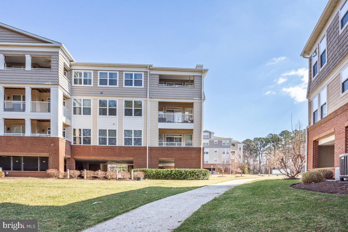 13824 Reef Way, Unit 301 Solomons, MD 20688 - Photo 50 of 64 Walking path to water or woods