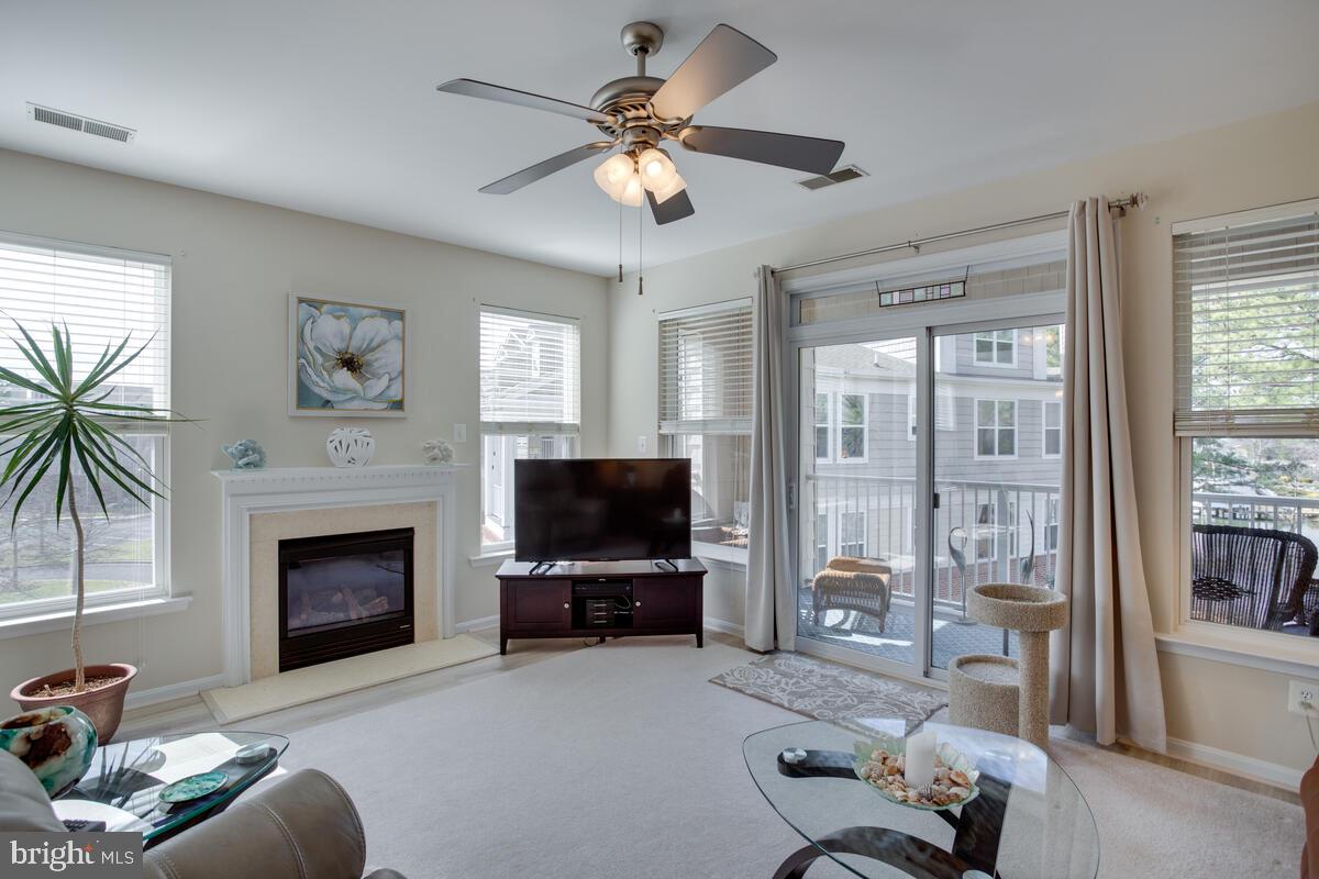 13824 Reef Way, Unit 301 Solomons, MD 20688 - Photo 7 of 64 Balcony access from Living Room