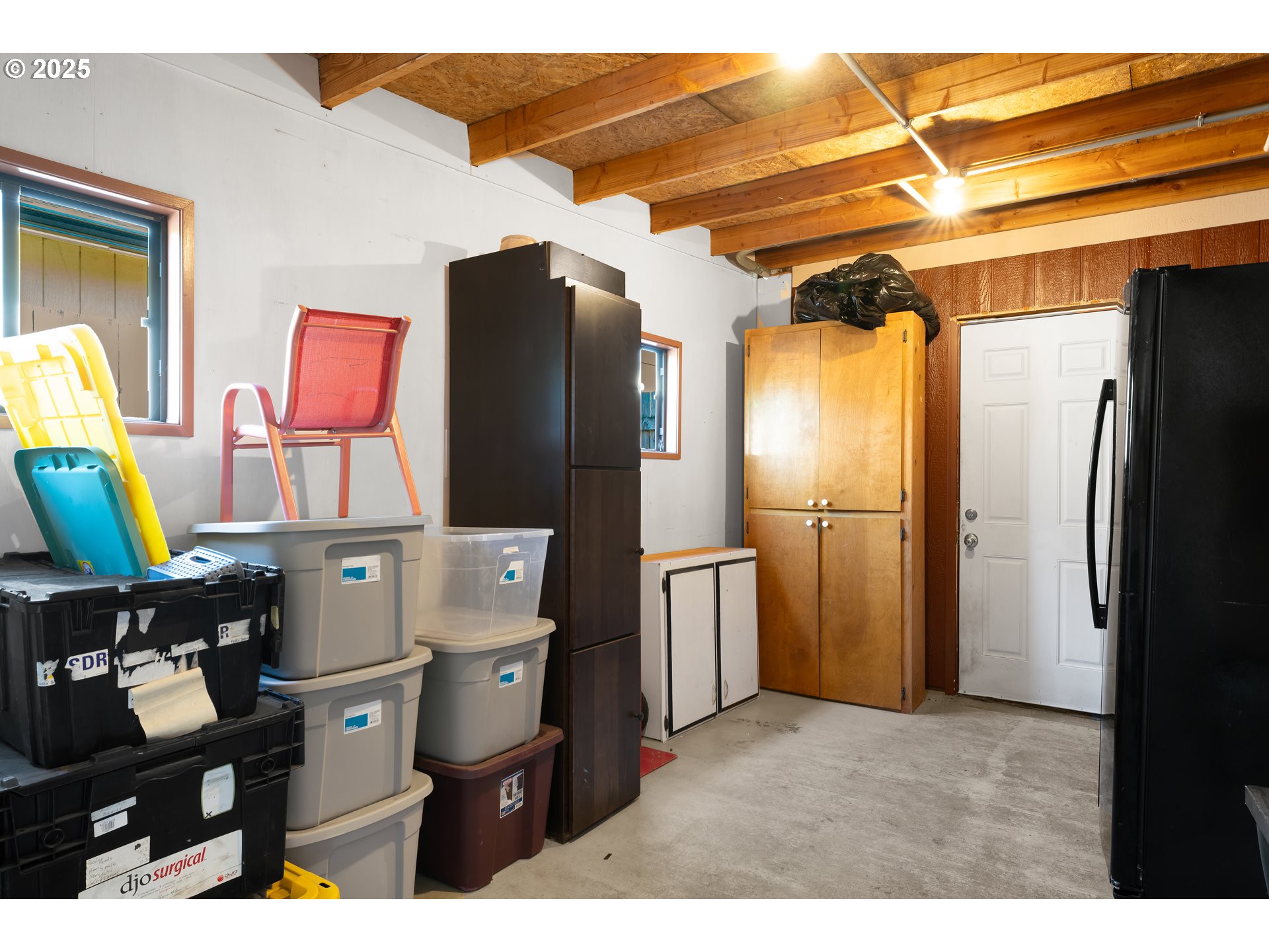630 Colonial Drive Springfield, OR 97477 - Photo 26 of 37 a kitchen that has a refrigerator and a table