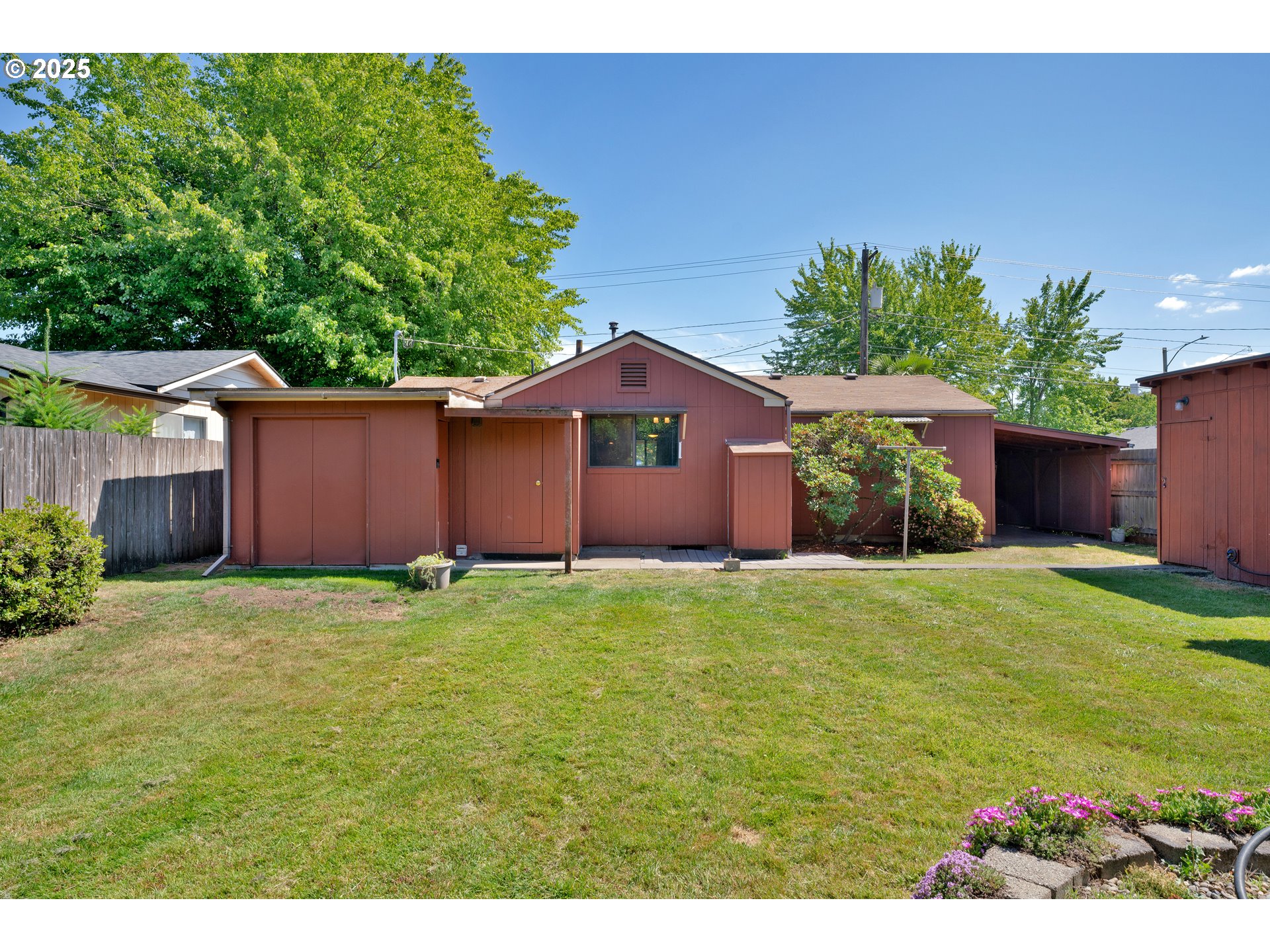 630 Colonial Drive Springfield, OR 97477 - Photo 30 of 37 a front view of a house with garden