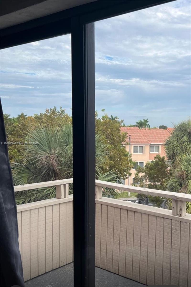 17600 Northwest 68th Avenue, Unit B4002 Hialeah, FL 33015 - Photo 6 of 7 a view of a balcony with an ocean view