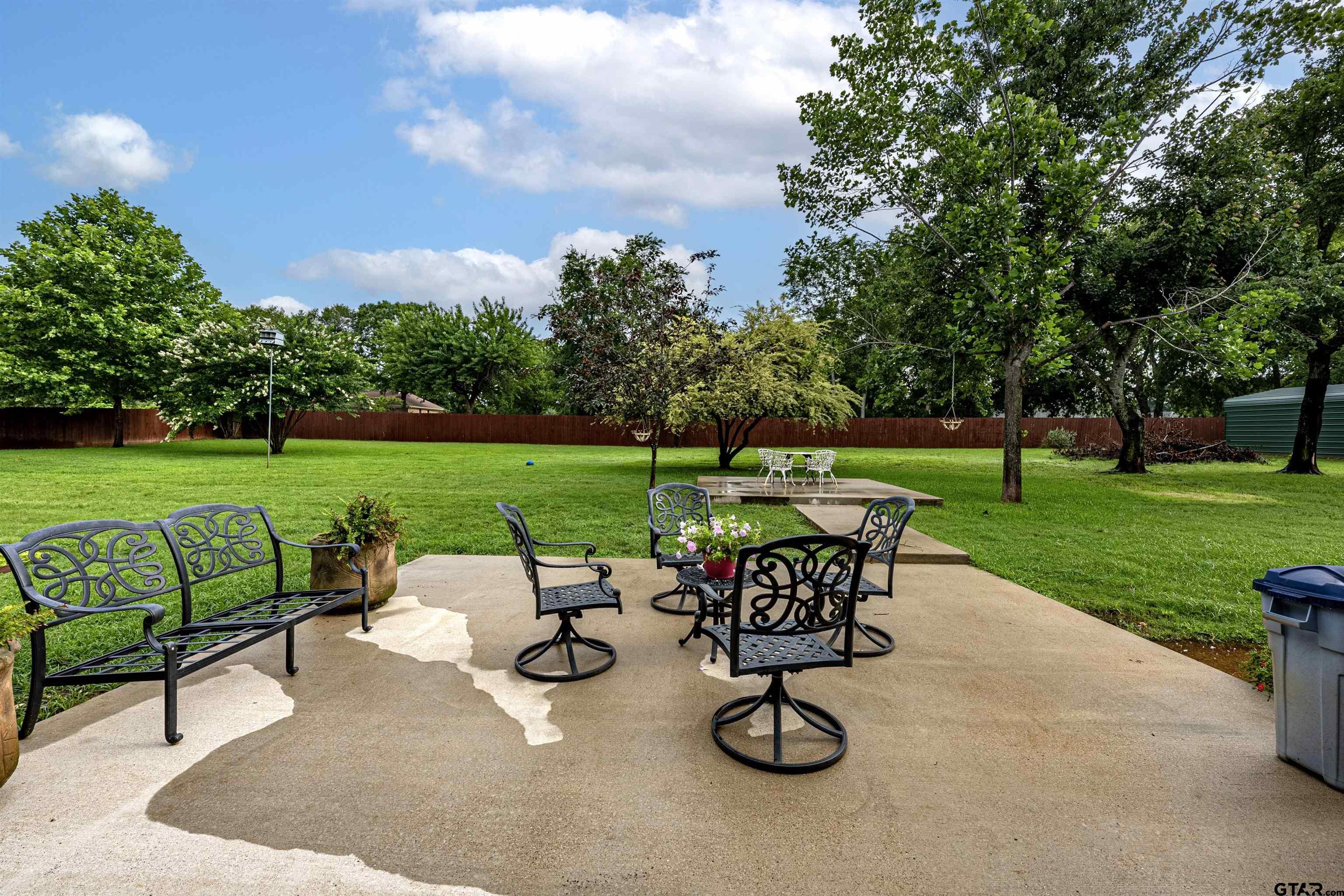 10074 Hillside Lane Flint, TX 75762 - Photo 19 of 22 a view of a garden with furniture