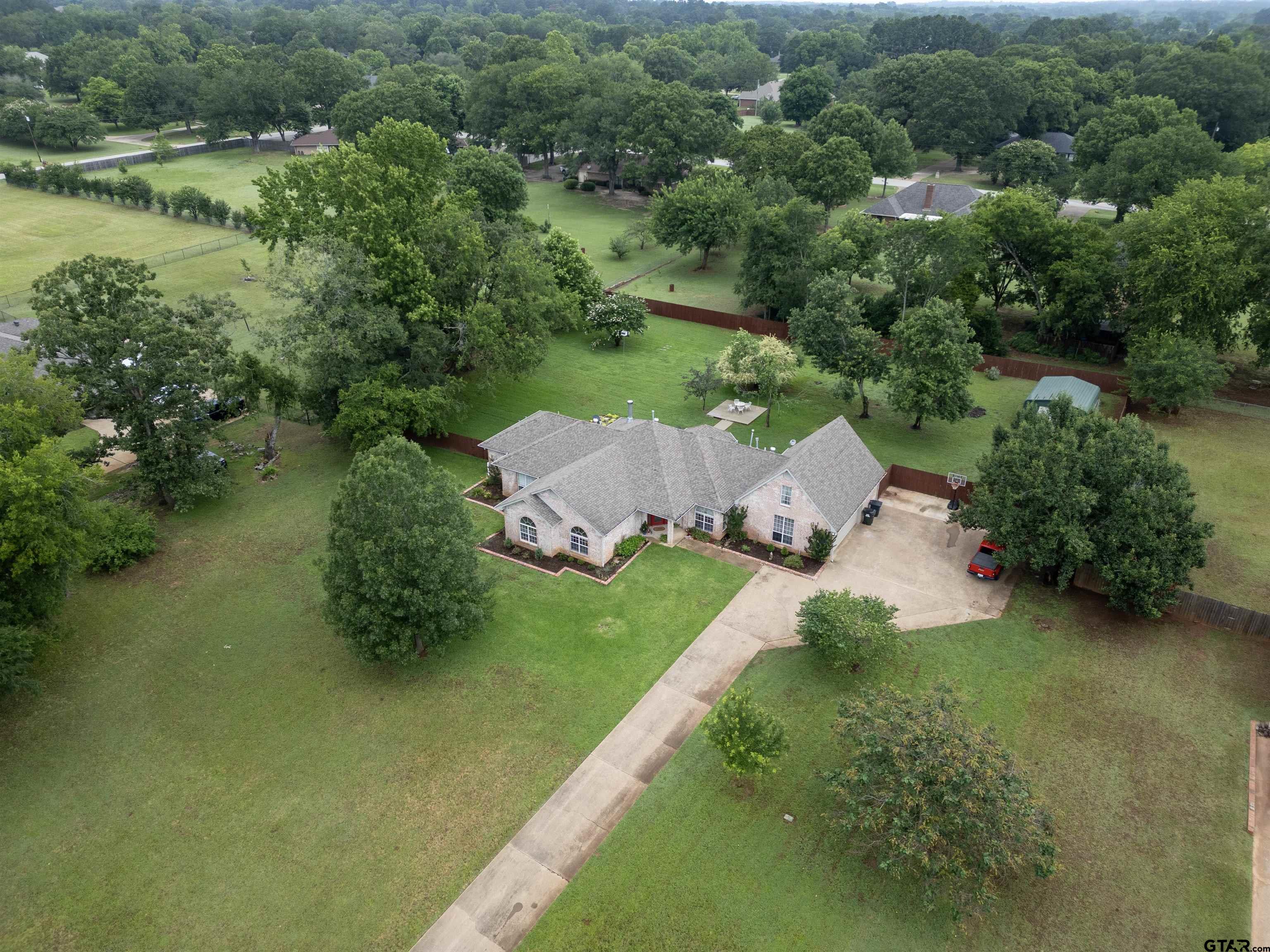 10074 Hillside Lane Flint, TX 75762 - Photo 2 of 22 an aerial view of a house with a yard and lake view