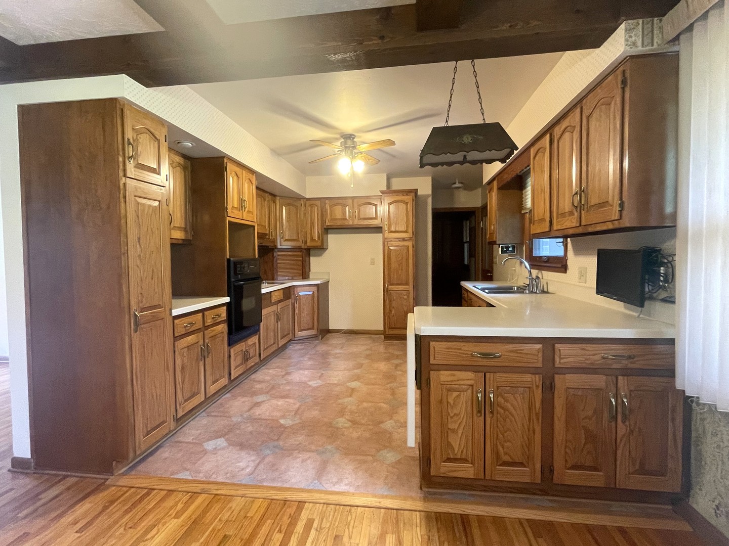 206 Palmyra Road Dixon, IL 61021 - Photo 13 of 46 a kitchen with granite countertop a stove and a refrigerator