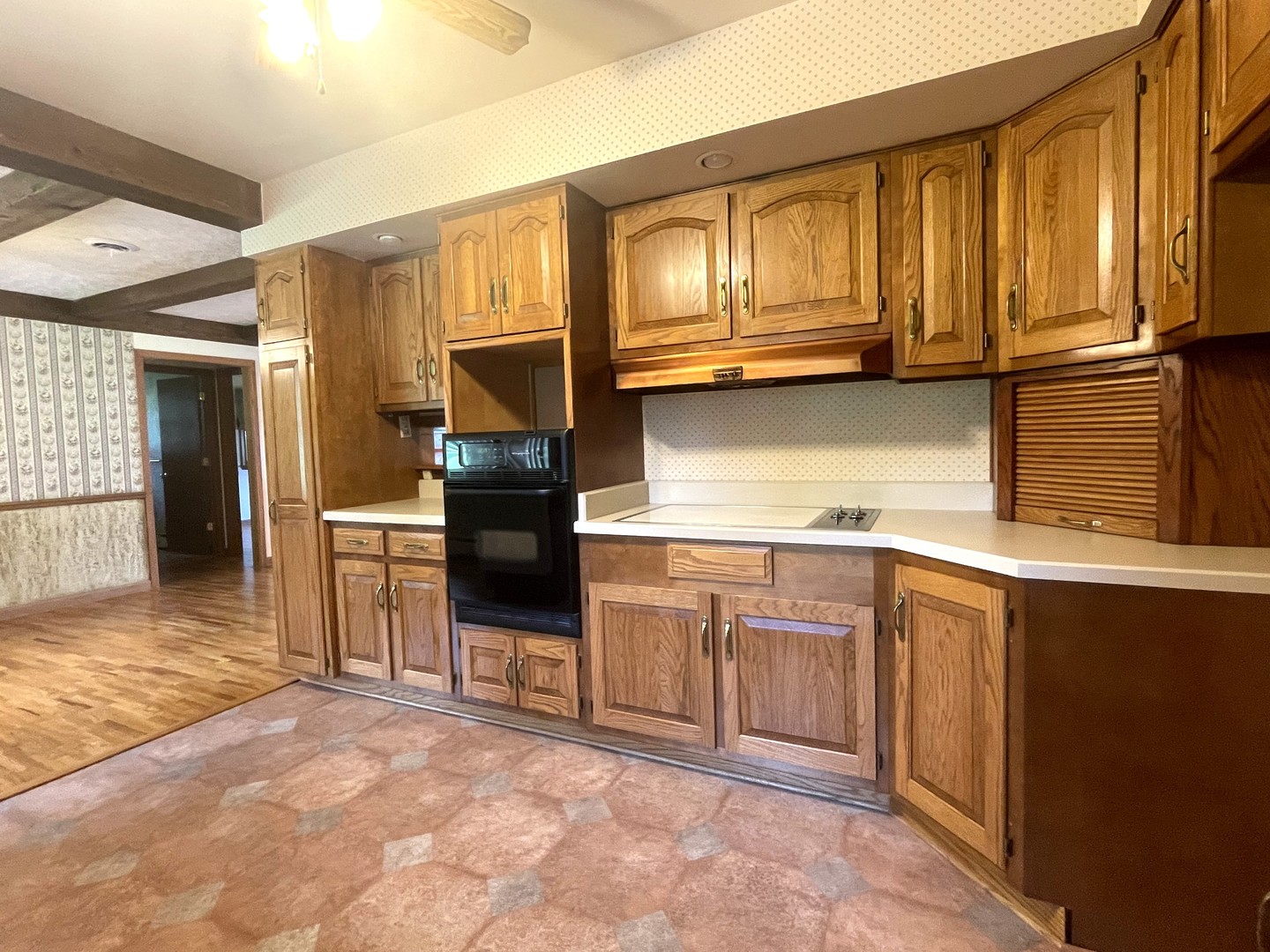 206 Palmyra Road Dixon, IL 61021 - Photo 15 of 46 a kitchen with stainless steel appliances granite countertop a refrigerator and cabinets