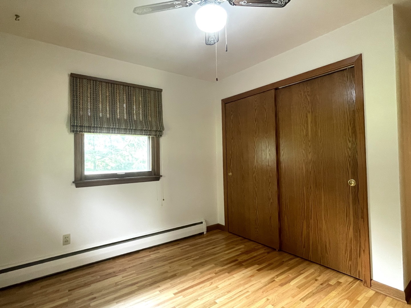 206 Palmyra Road Dixon, IL 61021 - Photo 21 of 46 a view of an empty room with wooden floor