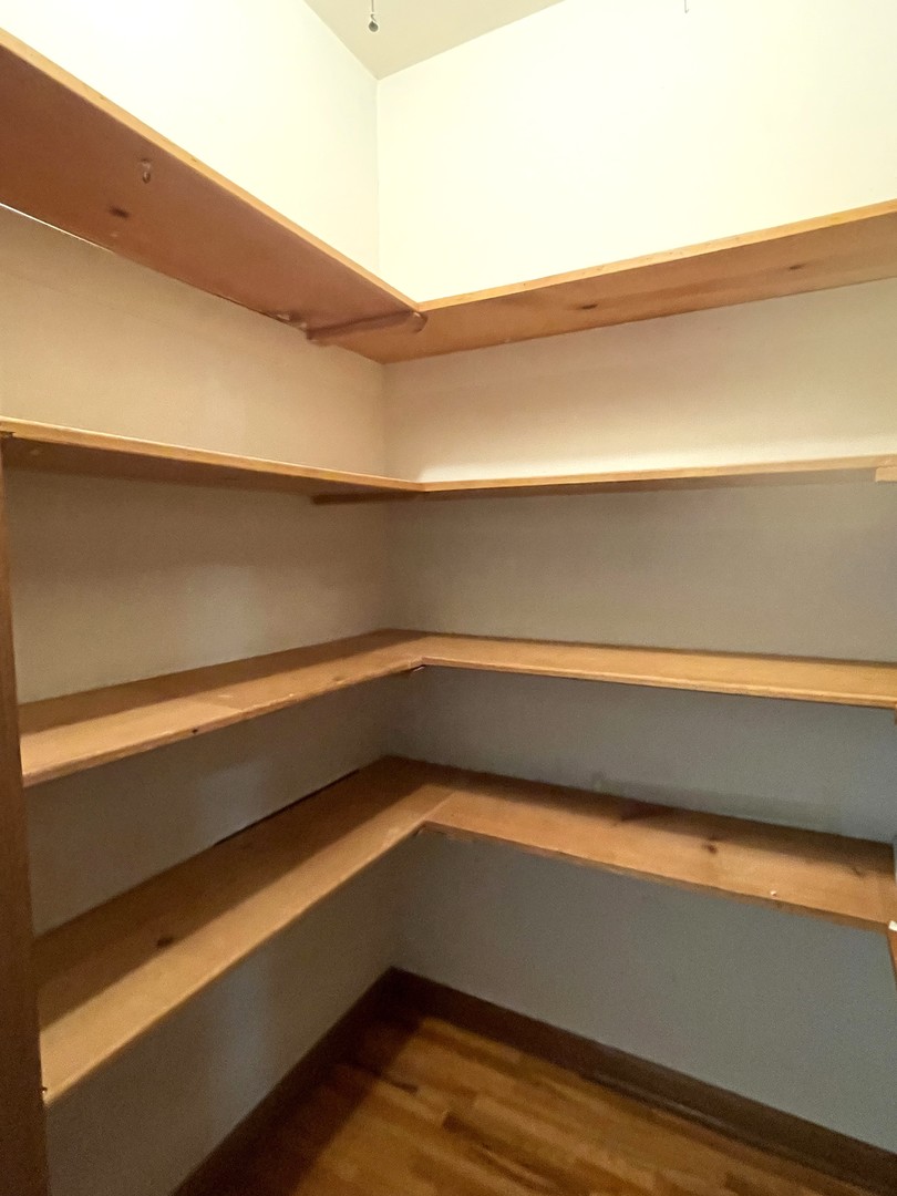206 Palmyra Road Dixon, IL 61021 - Photo 22 of 46 a storage room with wooden floor