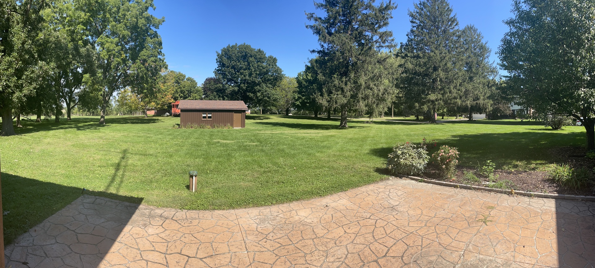206 Palmyra Road Dixon, IL 61021 - Photo 45 of 46 a view of a garden with a bench