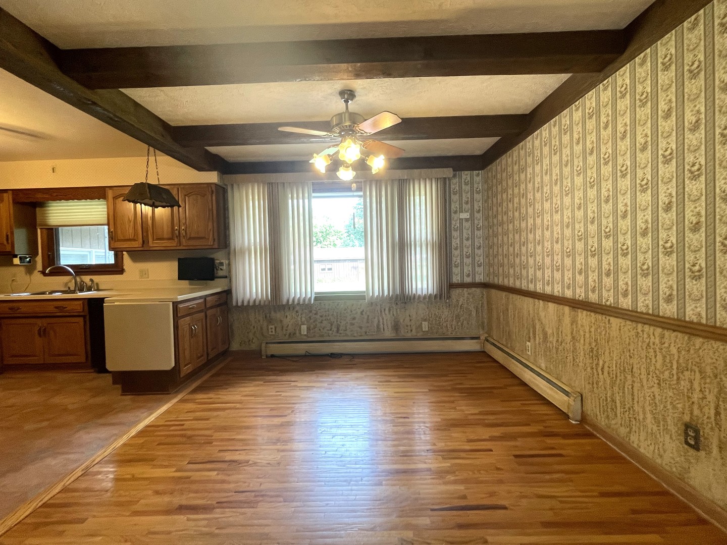 206 Palmyra Road Dixon, IL 61021 - Photo 10 of 46 a view of a kitchen with a sink and dishwasher