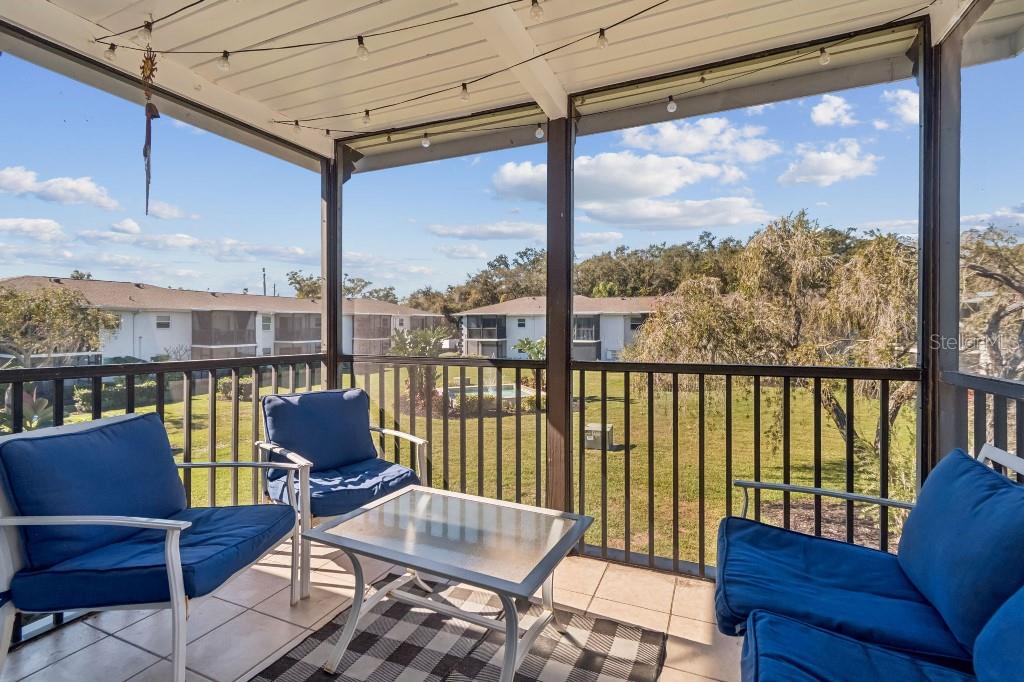 13125 Wilcox Road, Unit 6205 Largo, FL 33774 - Photo 37 of 48 a view of a balcony with couch