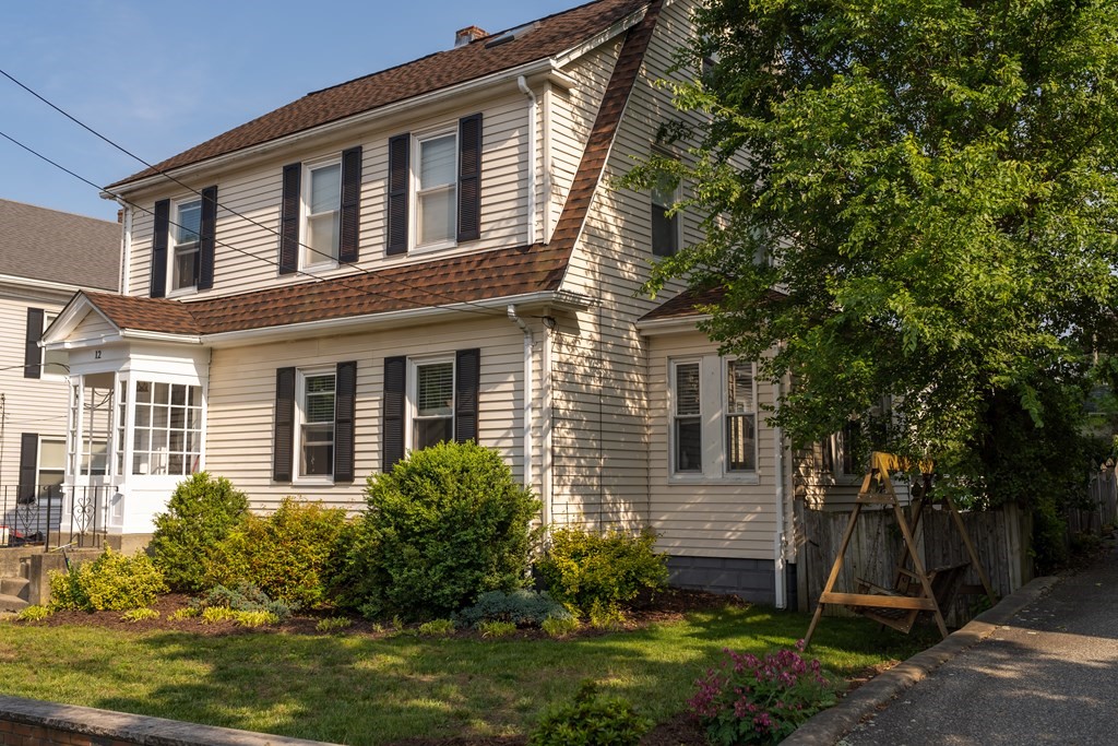 12 Newcastle Road Peabody, MA 01960 - Photo 2 of 35 a front view of a house with garden