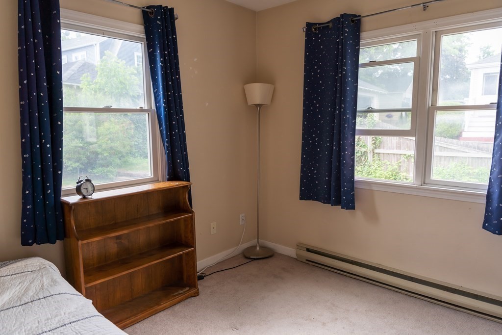12 Newcastle Road Peabody, MA 01960 - Photo 24 of 35 a view of an empty room with a window
