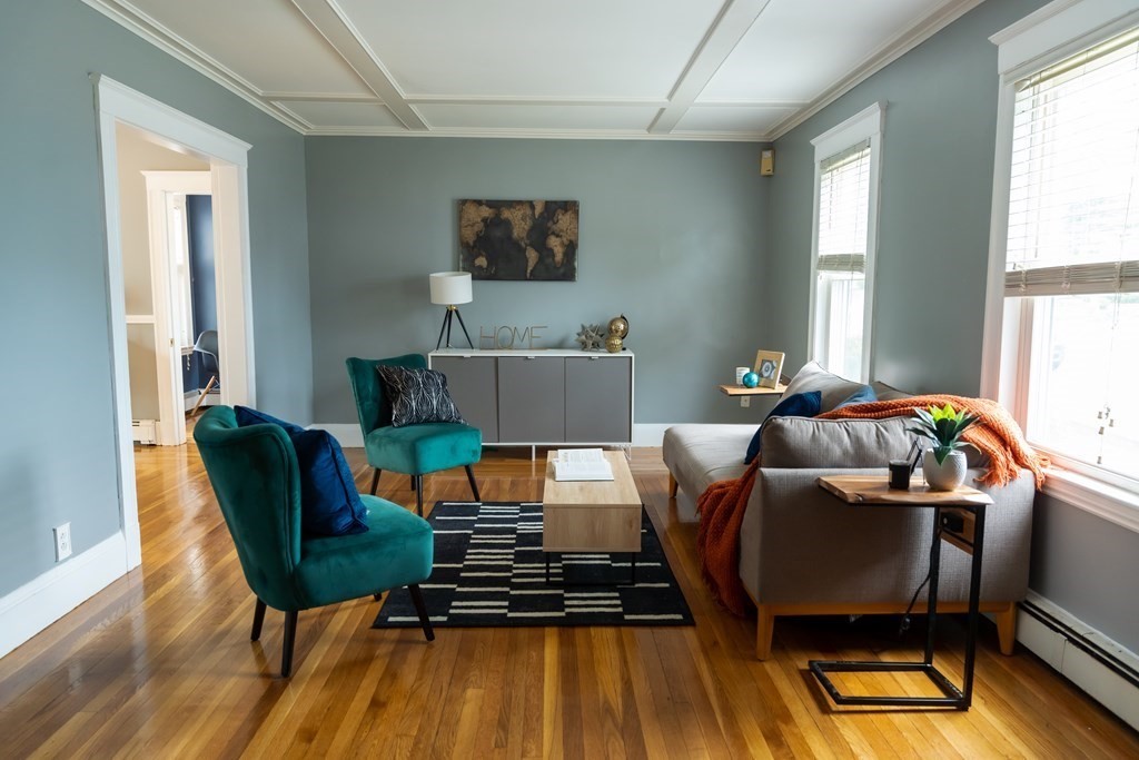 12 Newcastle Road Peabody, MA 01960 - Photo 4 of 35 a living room with furniture and a window