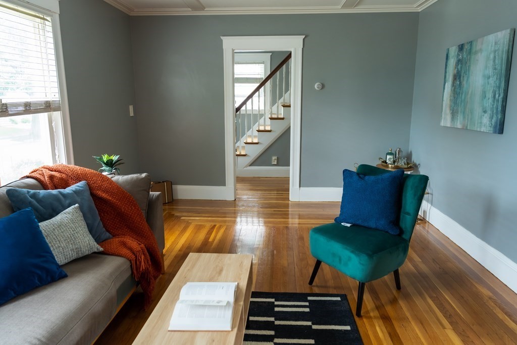 12 Newcastle Road Peabody, MA 01960 - Photo 5 of 35 a living room with furniture and a window
