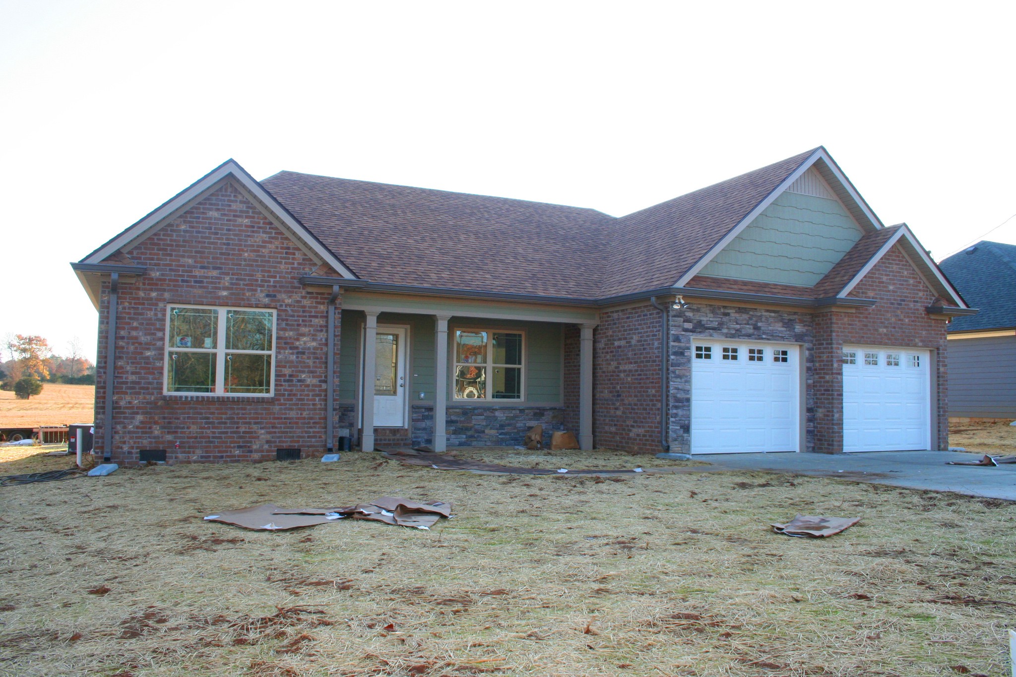 1193 Finley Beech Road Lewisburg, TN 37091 - Photo 1 of 2 a front view of a house with a garden