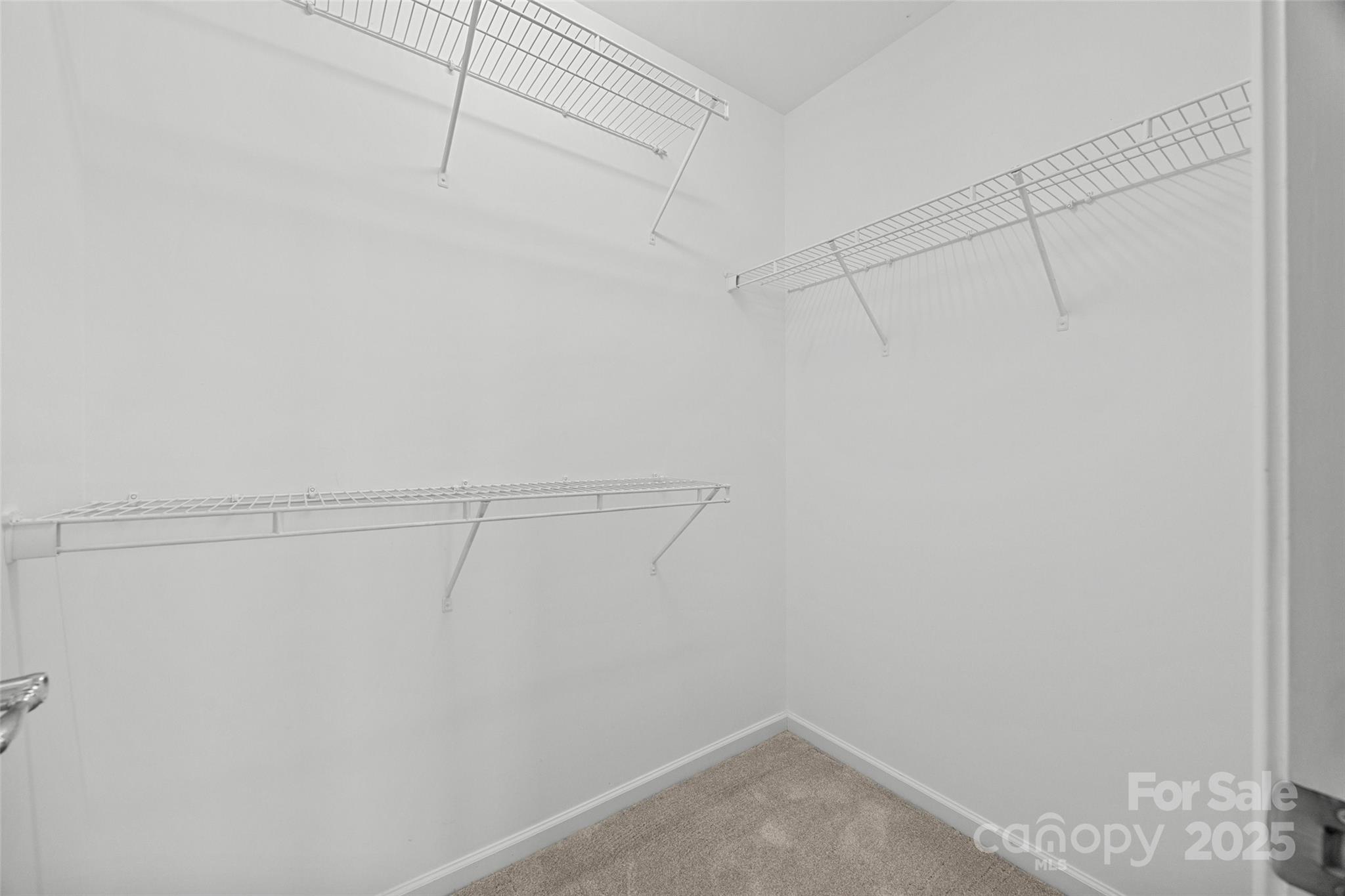 925 Lyndley Drive Fort Mill, SC 29708 - Photo 12 of 24 a view of a room with racks on the wall