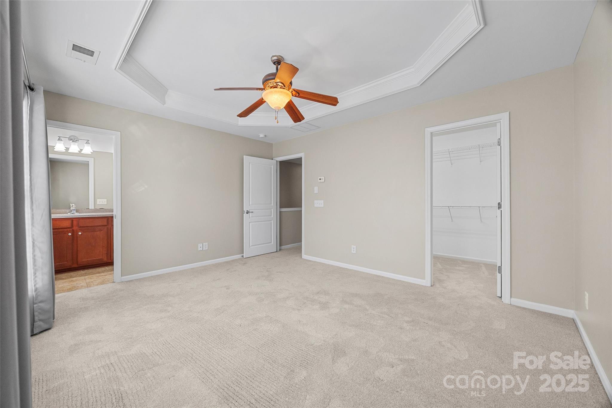 925 Lyndley Drive Fort Mill, SC 29708 - Photo 15 of 24 an empty room with windows and cabinet
