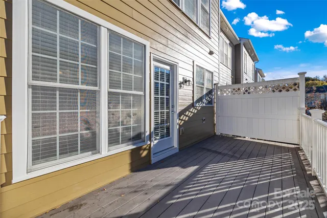 a view of a house with a large window