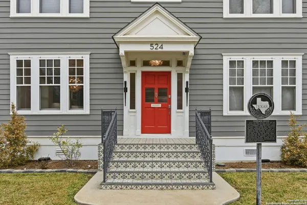 a front view of a building with garden