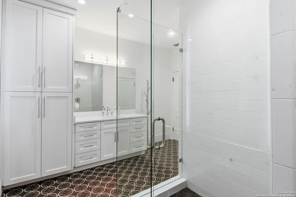 a bathroom with a sink and a bathtub