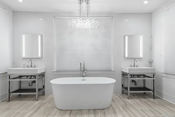 a front view of house with yard and trees